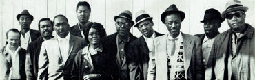 1967 American Folk Blues Festival ensemble: (l to r): Georges Adins (attendant), Hound Dog Taylor, Brownie McGhee, Odie Payne (drums), Dillard Crume (bass, MC), Koko Taylor, Sonny Terry, Little Walter, Son House, Skip James (?), 'Bukka' White; source:  American Folk Blues Festival '68 program, p. 3; photographer's name not given (?); click to enlarge!