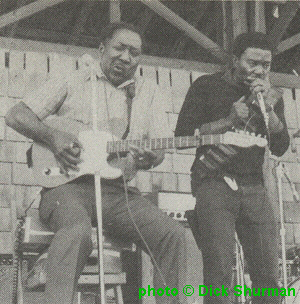Muddy Waters with George 'Mojo' Buford at Ann Arbor, Mich., 1973; source: Living Blues #42 (1979), p. 22; photographer: Dick Shurman