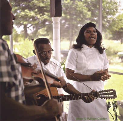 Butch Cage & Willie B. Thomas & wife Martha in front of Butch Cage's house in Zachary, Louisiana, 1960; source: William Claxton & Joachim E. Berendt 'Jazzlife - A Journey for Jazz across America in 1960'.- Köln/Cologne (Taschen) 2013, p. 63; photographer: William Claxton; click to enlarge!