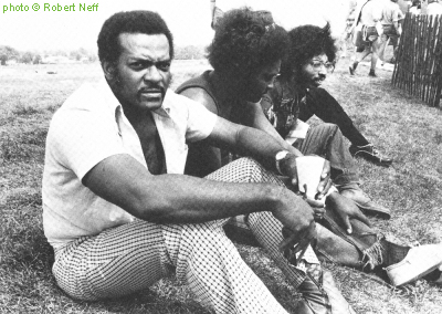 Jimmy Dawkins and band at Ann Arbor Blues & Jazz Festival in Exile, Windsor, Ontario, (most likely September 7) 1974; source: Robert Neff & Anthony Connor: Blues.- Boston (Godine) 1975, p. 68 // London (Latimer) 1976; photographer: Robert Neff
