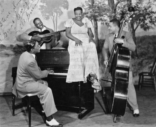 Lil Green and her band, Houston, TX, c. 1941: (l to r) Simeon Henry (piano), Big Bill Broonzy (guitar), Lil Green, Ransom Knowling (bass) (Frank Driggs Collection); click to enlarge!
