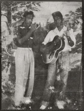 J E R R Y   M c C A I N, 1951 with his then guitarist Christopher Collins (Trumpet and Excello recordings); source: Block - Tijdschrift voor Blues #77 (jan/feb/mrt '91), p. 12;<br>reversed left to right & photoshopped by Stefan Wirz 