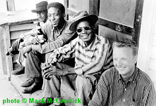 Unknown, Long Gone Miles, Lightnin' Hopkins, and Chris Strachwitz; from http://www.austinchronicle.com/issues/dispatch/2000-12-15; photo by Mack McCormick/music_feature2.html