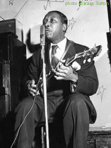 Muddy Waters at 708 Club, Chicago, ca. 1953; source: EBONY and JET magazine collection; photographer: Isaac Sutton
