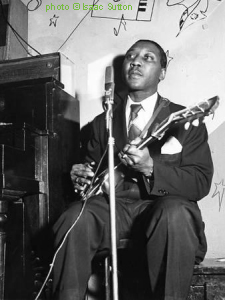 Muddy Waters at 708 Club, Chicago, ca. 1953; source: EBONY and JET magazine collection; photographer: Isaac Sutton